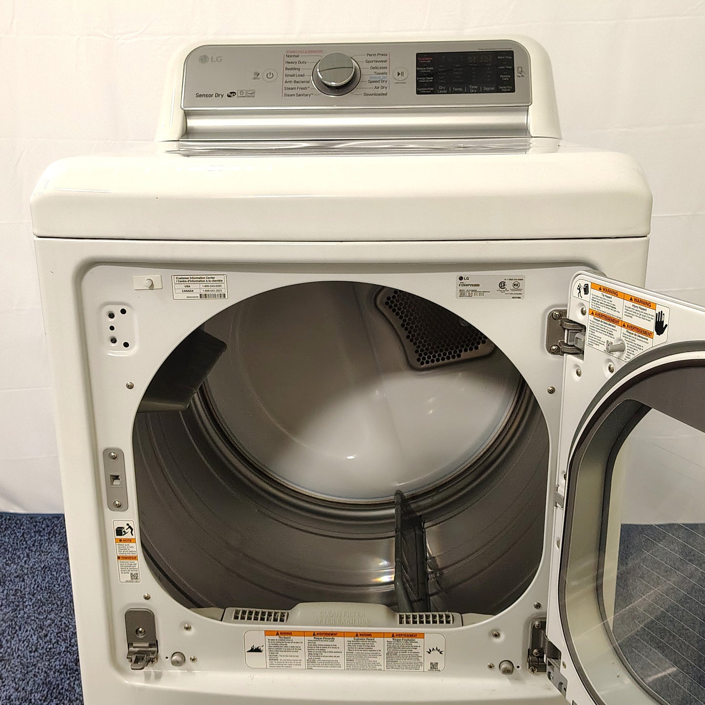 Used LG Senso Dry 7.3 cu. ft. Ultra Large Capacity TurboSteam™ Electric Dryer with EasyLoad™ Door DLEX7600WE