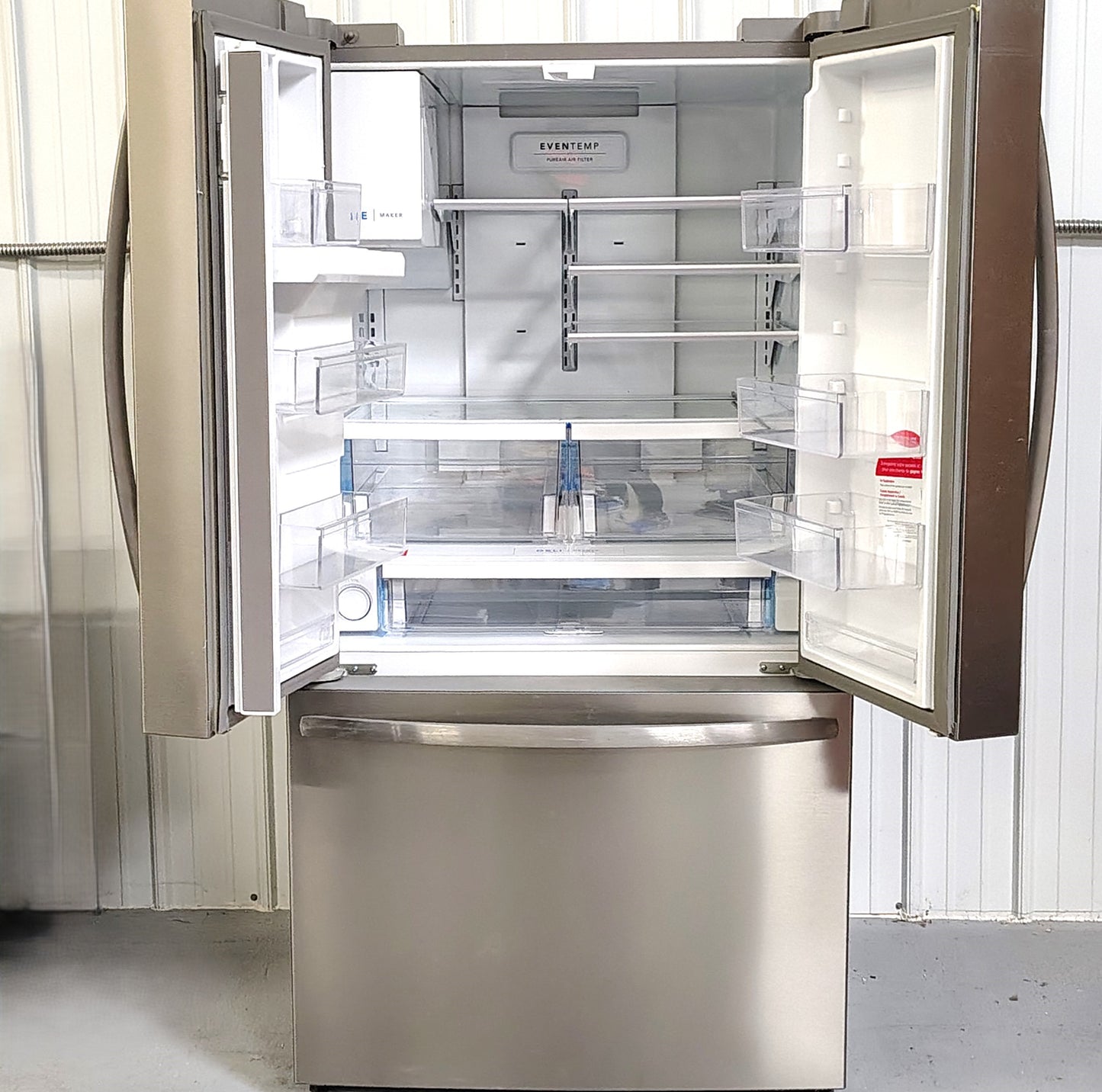 Frigidaire 27.8-cu ft French Door Refrigerator with Water and Ice Dispenser FRFG282LAF9