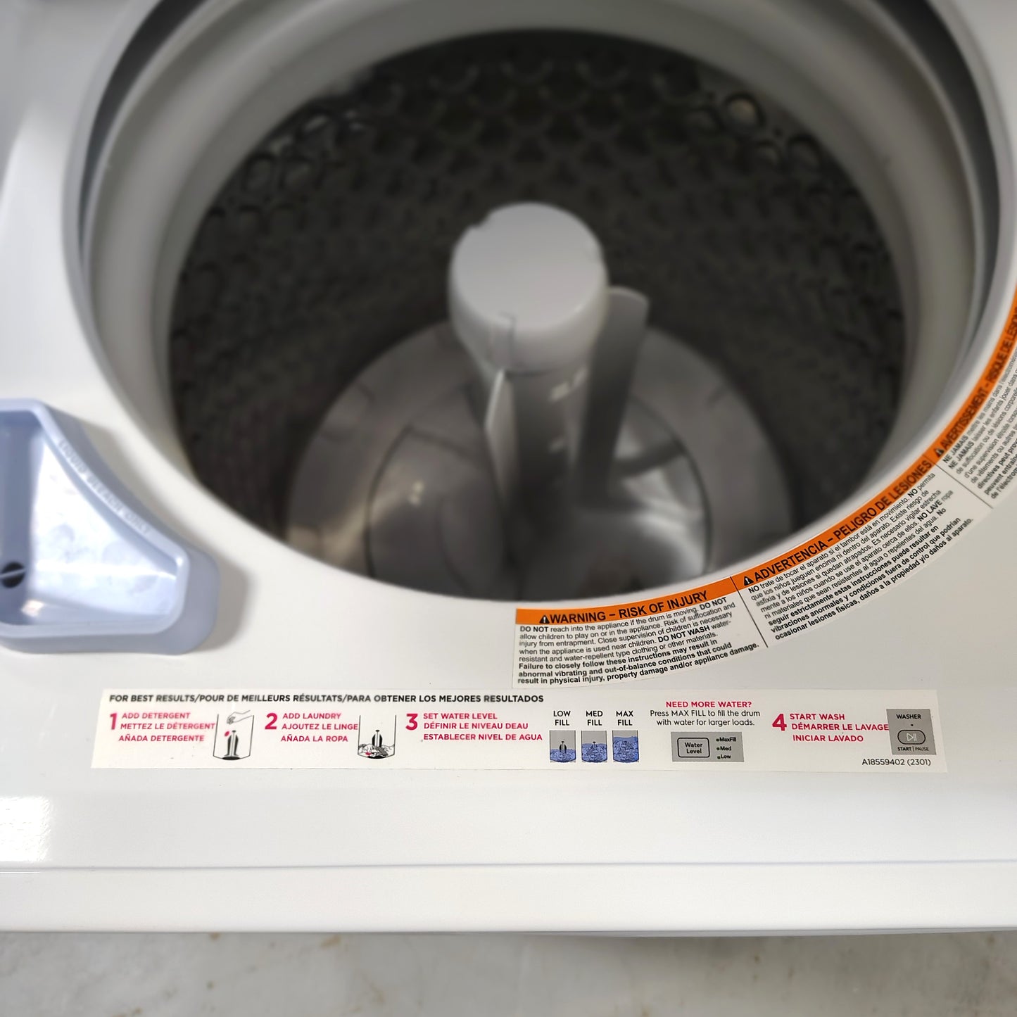 Frigidaire Quick Wash Dry Cycle, Maxfill Stacked Laundry Center with 3.9-cu ft Top load Washer and Electric 5.6-cu ft Dryer FLCE7522AW