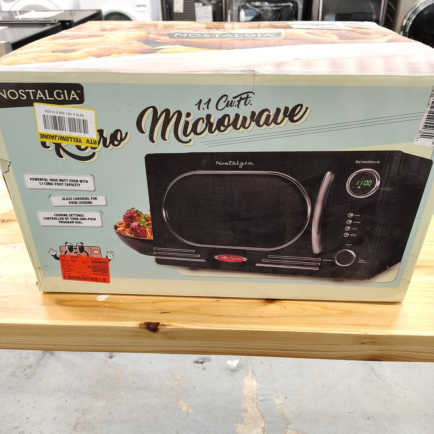 Nostalgia Retro 14.92 in. Wide 1.1 cu. ft. Electric 1000-Watts Microwave with Child Safety Lock NRMO11BK6A