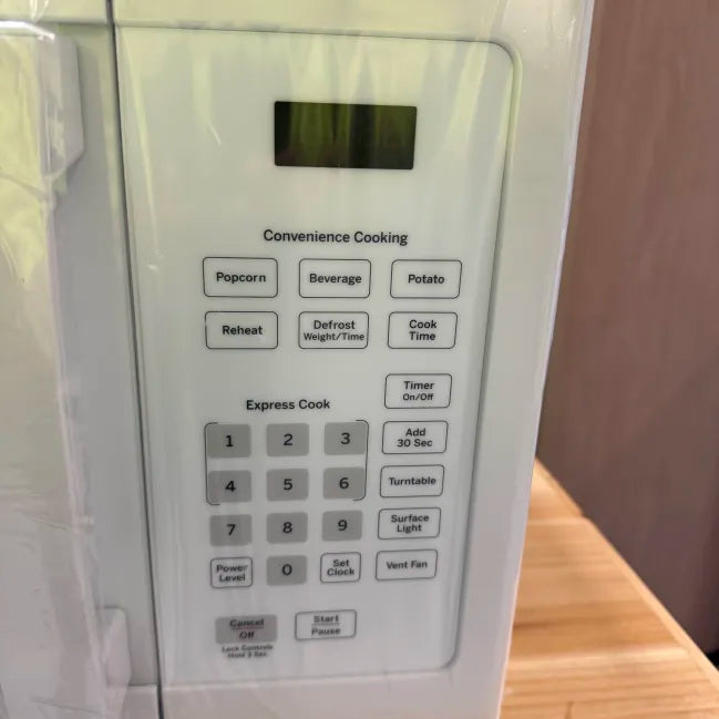 GE 1.7 cu. ft. Over the Range Microwave with Sensor Cooking in White MEZ68547803