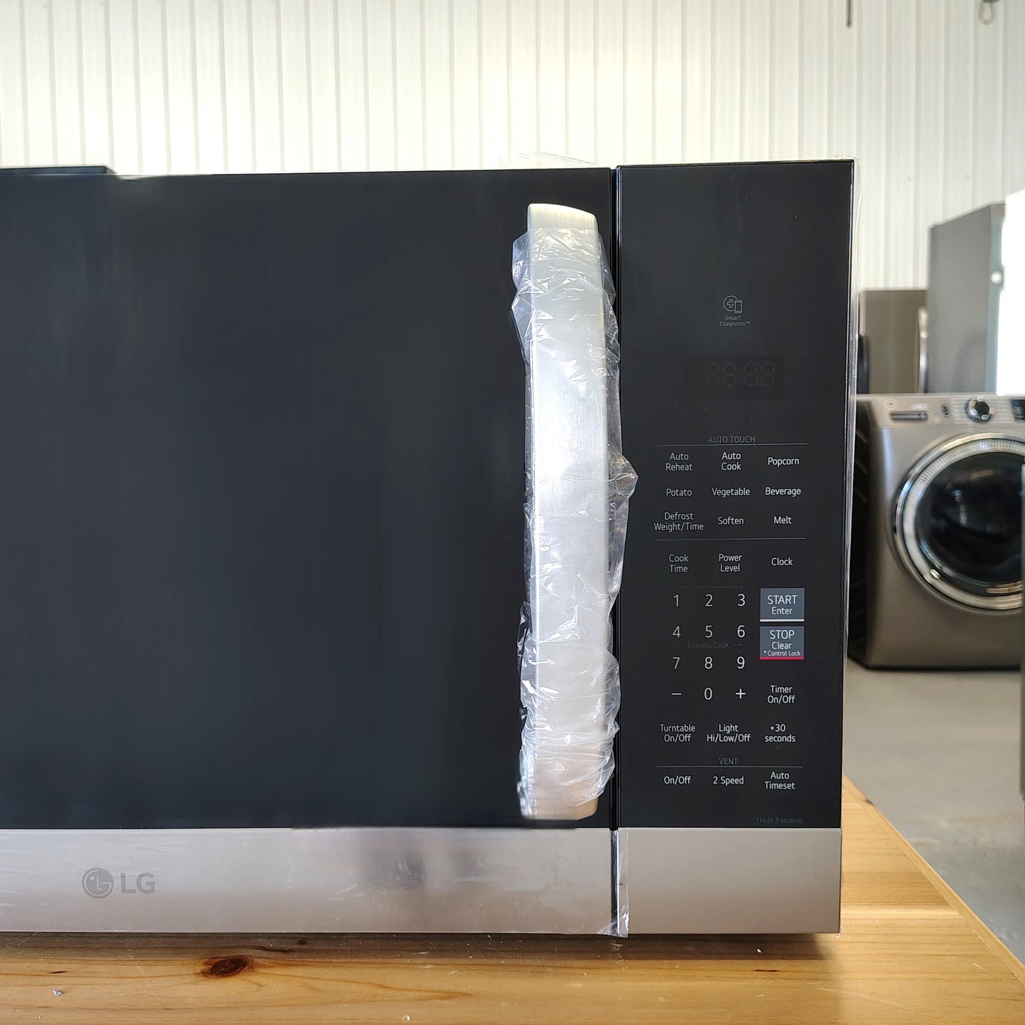 LG 1.7-cu ft Over-the-Range Microwave with Sensor Cooking MVEM1721F