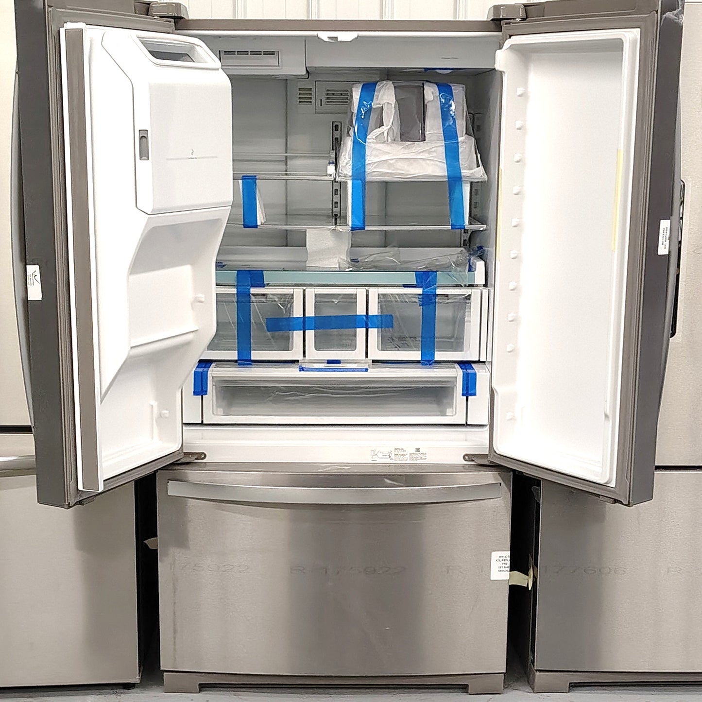 Whirlpool 26.8 cu. ft. French Door Refrigerator in Fingerprint Resistant Stainless Steel with Ice Maker and Water and Ice Dispenser WRF767SDHZ04