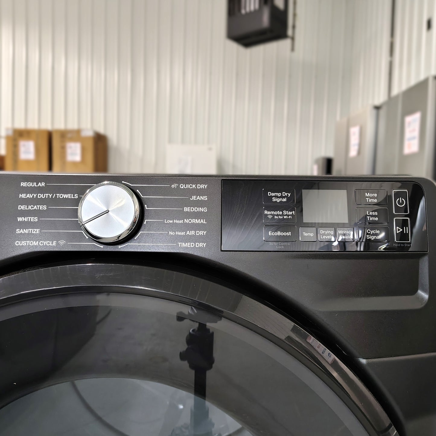 Whirlpool 7.4 cu. ft. vented Front Load Electric Dryer in Volcano Black with Wrinkle Shield Option WED5720RU0